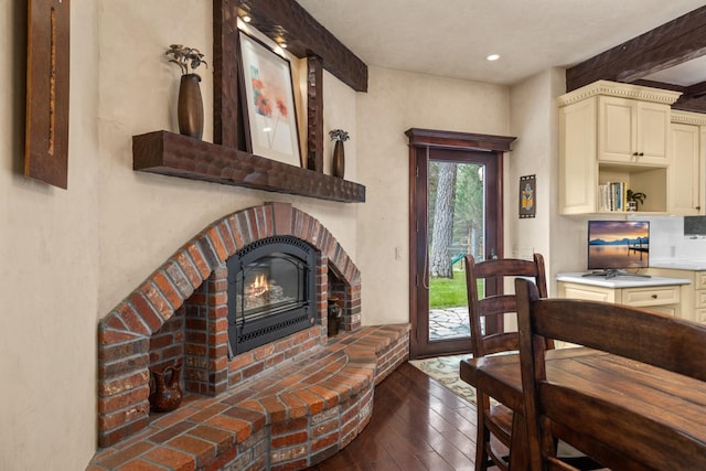 360 Plantation Dr, Kalispell, MT 59901 - dining room featuring hardwood / wood-style floors, a brick fireplace, recessed lighting, and beam ceiling
