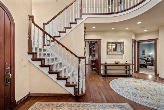 360 Plantation Dr, Kalispell, MT 59901 - entryway featuring wood-type flooring, stairway, recessed lighting, and a high ceiling