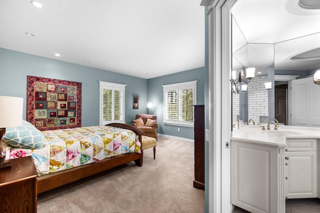 360 Plantation Dr, Kalispell, MT 59901 - bedroom with a sink, light colored carpet, baseboards, and recessed lighting