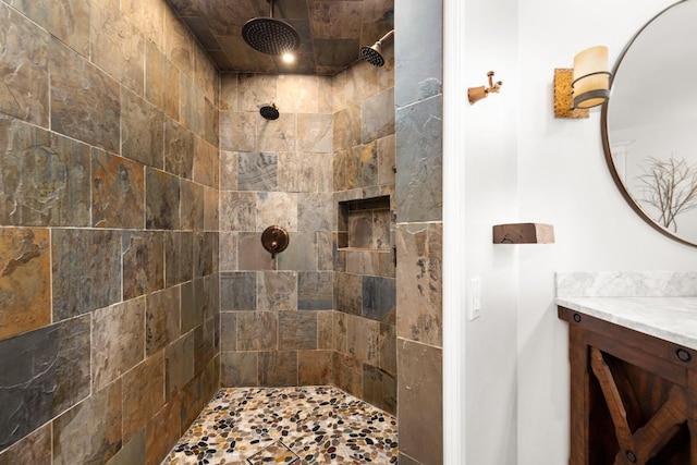 360 Plantation Dr, Kalispell, MT 59901 - bathroom featuring tiled shower and vanity