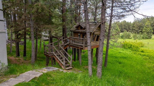 360 Plantation Dr, Kalispell, MT 59901 - view of outbuilding featuring stairs and a view of trees