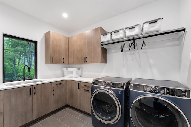 175 N Prairiesmoke Cir, Whitefish, MT 59937 - laundry area with cabinet space, washer and clothes dryer, dark tile patterned flooring, and recessed lighting