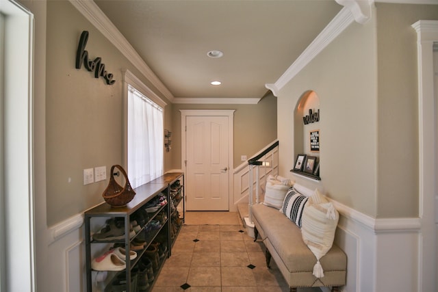 2413 Capstone Ct, Thompson Falls, MT 59873 - entrance foyer featuring light tile patterned flooring, recessed lighting, a wainscoted wall, and crown molding