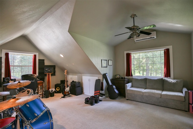 2413 Capstone Ct, Thompson Falls, MT 59873 - game room with vaulted ceiling, an AC wall unit, carpet floors, plenty of natural light, and a ceiling fan