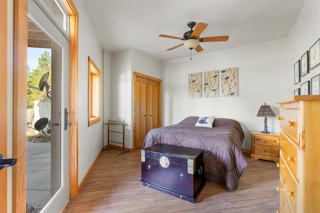 956 Falling Star Rd, Victor, MT 59875 - bedroom with light wood-type flooring and ceiling fan