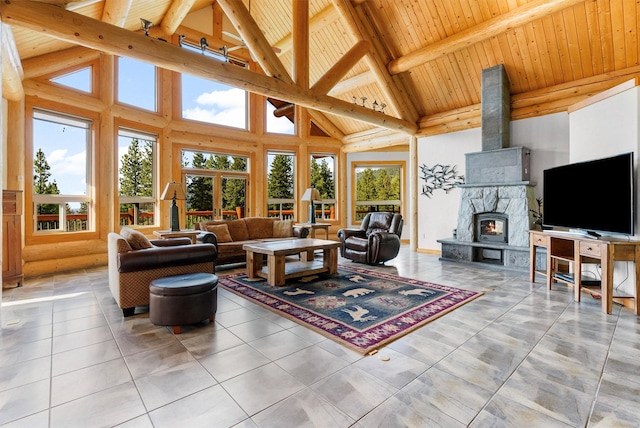 956 Falling Star Rd, Victor, MT 59875 - living area with high vaulted ceiling, tile patterned flooring, and a wooden ceiling with exposed beams