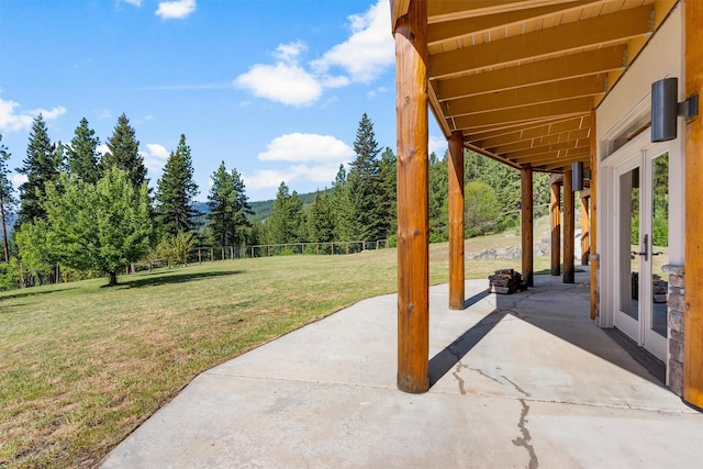 956 Falling Star Rd, Victor, MT 59875 - view of patio featuring french doors