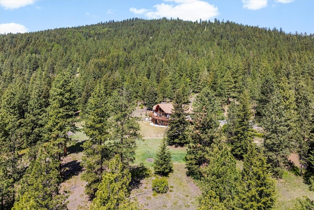 956 Falling Star Rd, Victor, MT 59875 - view of subject property featuring a heavily wooded area