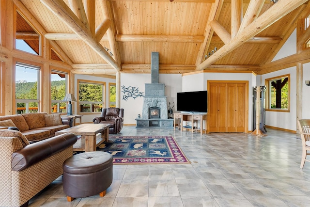 956 Falling Star Rd, Victor, MT 59875 - living area featuring healthy amount of natural light, high vaulted ceiling, and a wooden ceiling with exposed beams