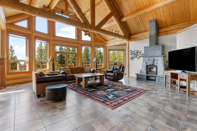 956 Falling Star Rd, Victor, MT 59875 - living area with high vaulted ceiling, tile patterned floors, and a wood ceiling with exposed beams
