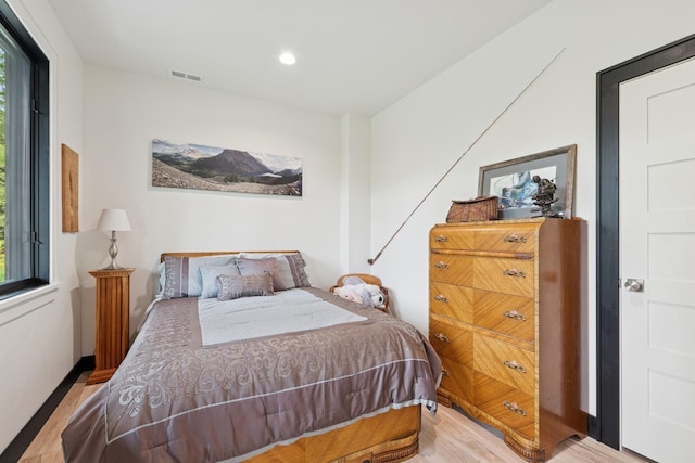 103 Glacier Hills Dr E, Martin City, MT 59926 - bedroom with light wood-style flooring and recessed lighting
