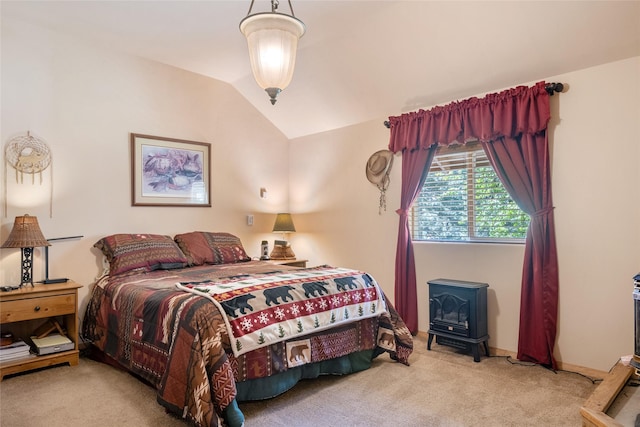 18711 Copper Ridge Trl, Florence, MT 59833 - bedroom with a wood stove, carpet, and lofted ceiling