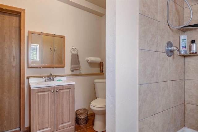18711 Copper Ridge Trl, Florence, MT 59833 - full bath featuring toilet, vanity, and tile patterned flooring