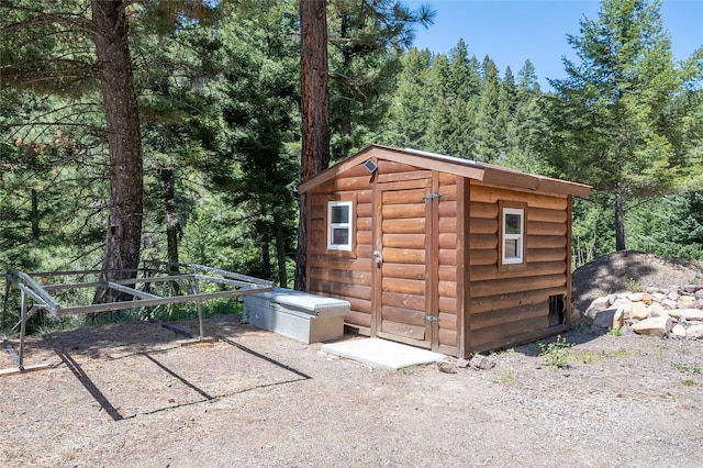18711 Copper Ridge Trl, Florence, MT 59833 - view of shed with a view of trees