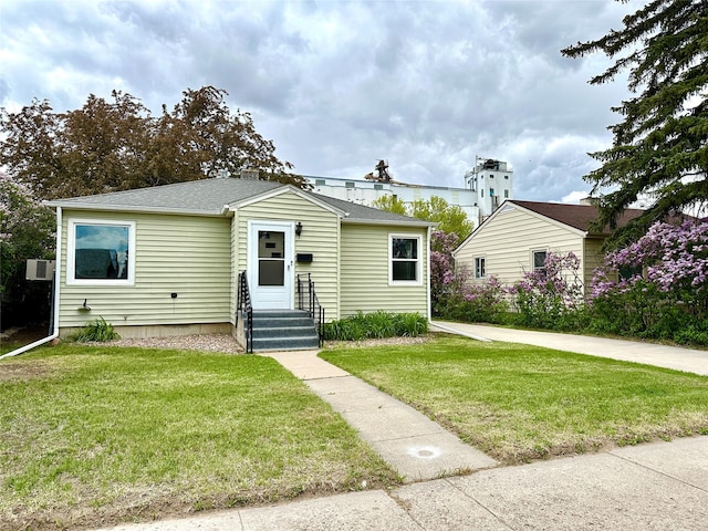 2513 8th Ave N, Great Falls, MT 59401 - bungalow-style house with a front lawn and a shingled roof