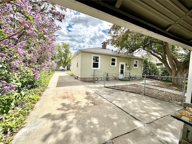 2513 8th Ave N, Great Falls, MT 59401 - rear view of house with concrete driveway