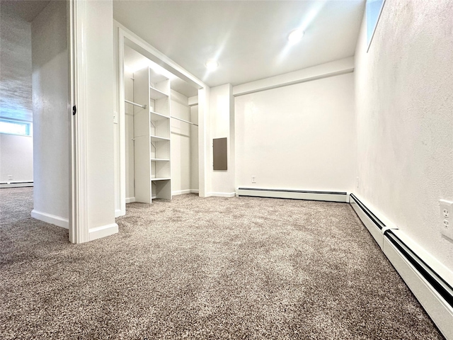 2513 8th Ave N, Great Falls, MT 59401 - unfurnished bedroom with carpet flooring, a baseboard radiator, and a baseboard heating unit