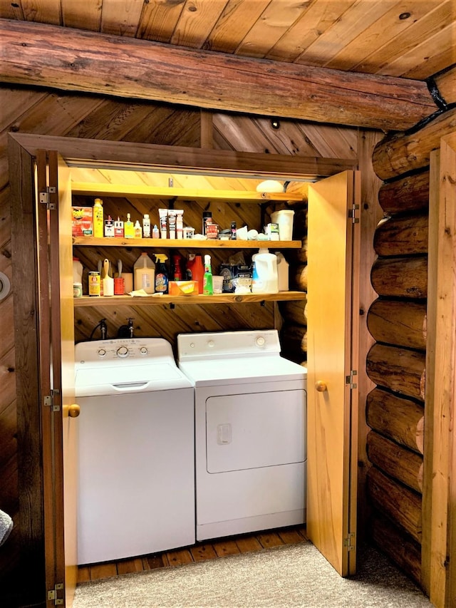 7191 Boy Scout Rd, Seeley Lake, MT 59868 - laundry room featuring washer and dryer, log walls, light wood finished floors, and wood ceiling