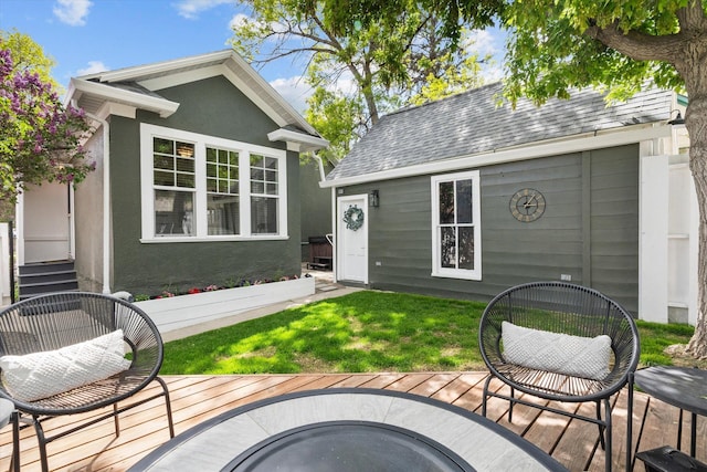 322 W Lawrence St, Helena, MT 59601 - wooden terrace featuring an outdoor structure and a yard