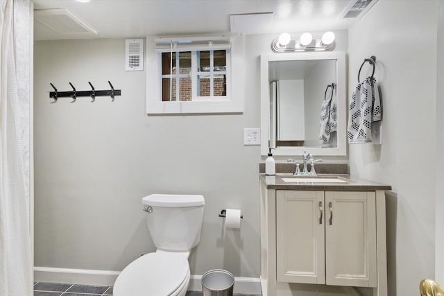 322 W Lawrence St, Helena, MT 59601 - bathroom featuring toilet, vanity, baseboards, and tile patterned flooring