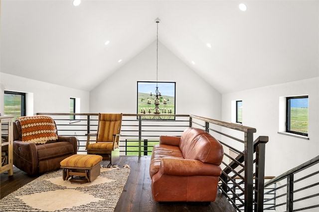 42730 Ridgeway Rd, Charlo, MT 59824 - sitting room featuring an upstairs landing, hardwood / wood-style floors, healthy amount of natural light, recessed lighting, and high vaulted ceiling