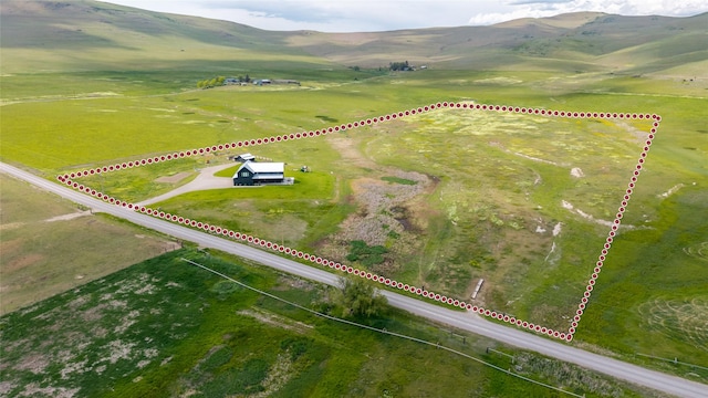 42730 Ridgeway Rd, Charlo, MT 59824 - aerial view of sparsely populated area featuring a mountain backdrop