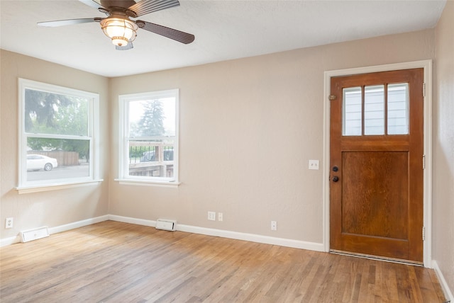 2109 S 5th St W, Missoula, MT 59801 - foyer with wood finished floors, baseboards, and a ceiling fan