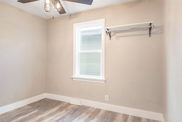 2109 S 5th St W, Missoula, MT 59801 - spare room with ceiling fan, baseboards, wood finished floors, and healthy amount of natural light