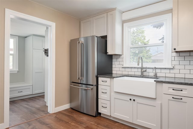 2109 S 5th St W, Missoula, MT 59801 - kitchen featuring freestanding refrigerator, a sink, tasteful backsplash, and dark wood-type flooring