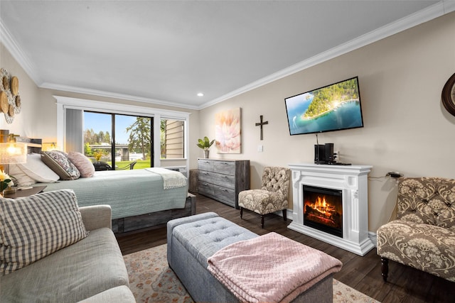 180 Vista Ln Unit 152, Bigfork, MT 59911 - bedroom featuring crown molding, wood finished floors, a warm lit fireplace, access to exterior, and recessed lighting