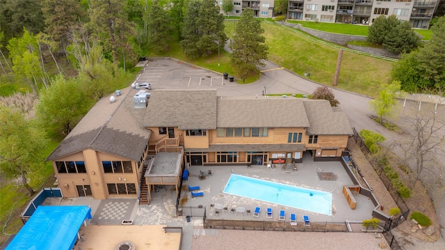 180 Vista Ln Unit 152, Bigfork, MT 59911 - view of swimming pool featuring a fenced backyard, a covered pool, and a patio area