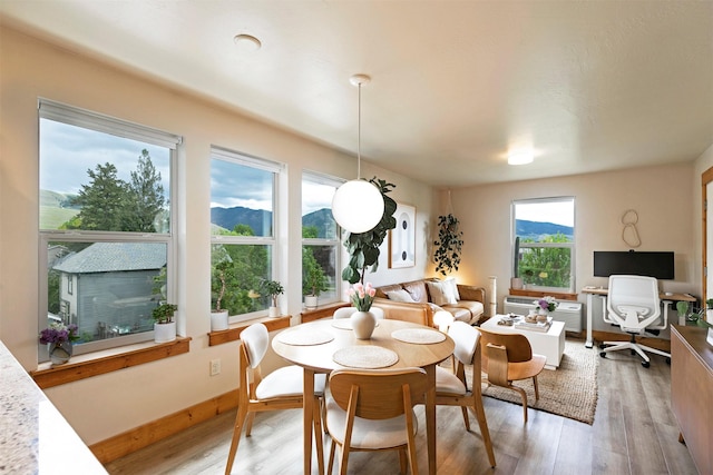1245 Waverly St Unit 301, Missoula, MT 59802 - dining area featuring light wood-style flooring, an office area, and baseboards