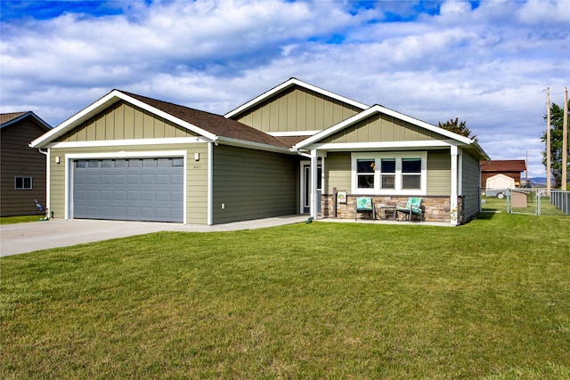 435 6th Ave NW, Ronan, MT 59864 - craftsman-style home with a garage, board and batten siding, concrete driveway, and stone siding