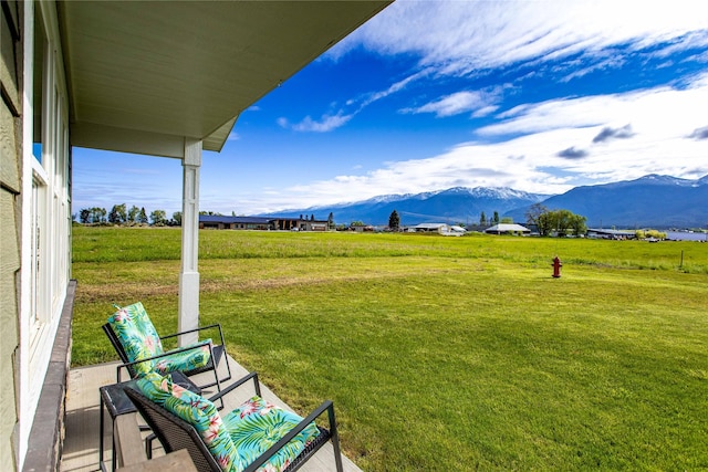 435 6th Ave NW, Ronan, MT 59864 - view of grassy yard featuring a mountain view