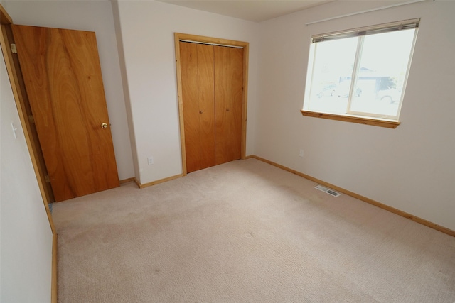 506 Centennial Dr, Sheridan, MT 59749 - unfurnished bedroom featuring carpet, baseboards, and a closet