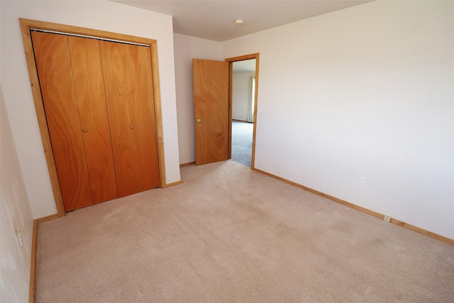 506 Centennial Dr, Sheridan, MT 59749 - unfurnished bedroom with light carpet, a closet, and baseboards