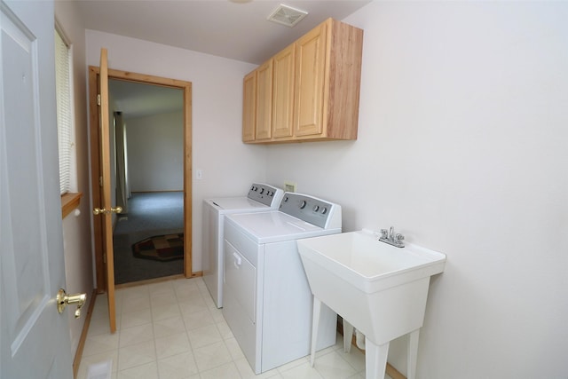 506 Centennial Dr, Sheridan, MT 59749 - laundry area featuring independent washer and dryer and cabinet space