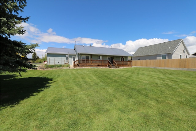 506 Centennial Dr, Sheridan, MT 59749 - rear view of property featuring a deck and metal roof