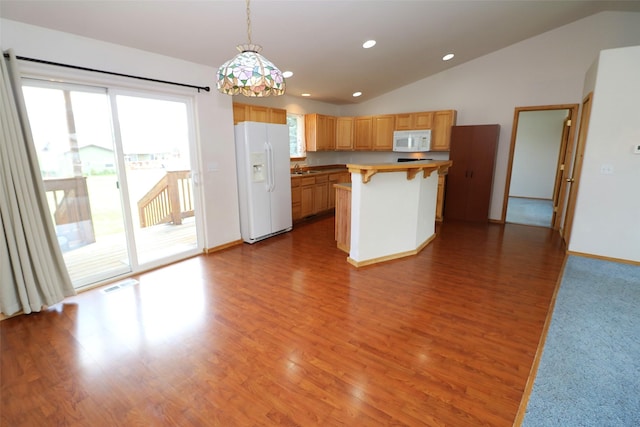 506 Centennial Dr, Sheridan, MT 59749 - kitchen with white appliances, a breakfast bar, lofted ceiling, light wood-style floors, and decorative light fixtures