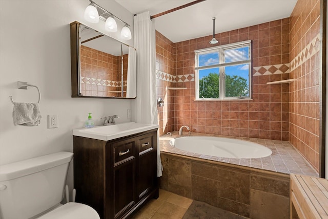 209 Caps Rd, Kalispell, MT 59901 - bathroom with vanity, tiled shower / bath, and tile patterned floors
