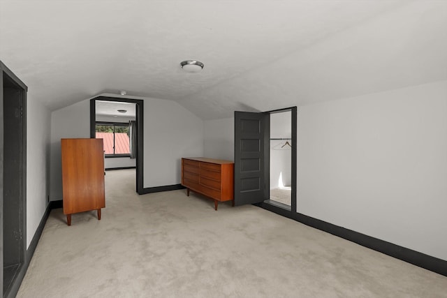 209 Caps Rd, Kalispell, MT 59901 - bonus room with light colored carpet and lofted ceiling