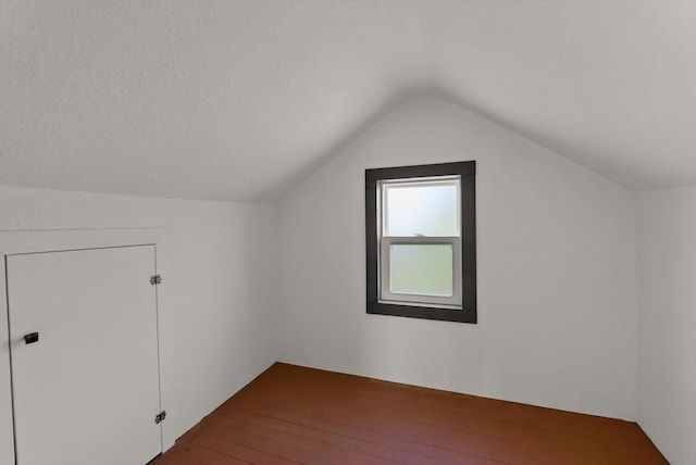 209 Caps Rd, Kalispell, MT 59901 - bonus room featuring lofted ceiling and hardwood / wood-style flooring