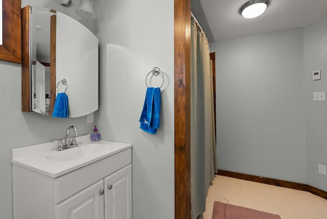 209 Caps Rd, Kalispell, MT 59901 - full bathroom with vanity and tile patterned floors