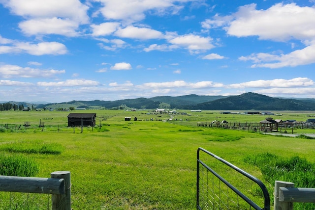 209 Caps Rd, Kalispell, MT 59901 - view of mountain background with a pastoral area and rural landscape