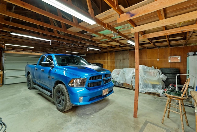 209 Caps Rd, Kalispell, MT 59901 - garage featuring wooden walls