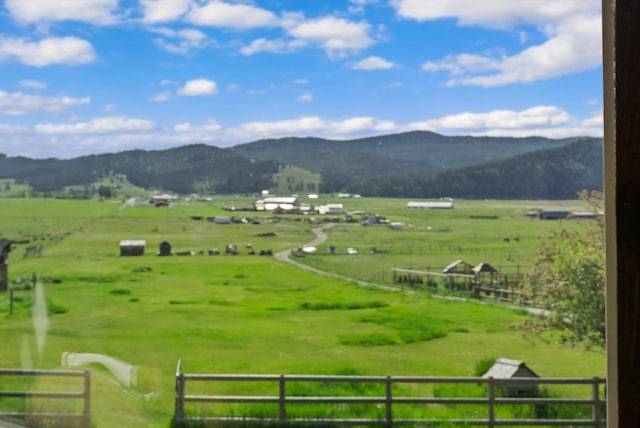 209 Caps Rd, Kalispell, MT 59901 - view of mountain backdrop featuring a pastoral area and rural landscape