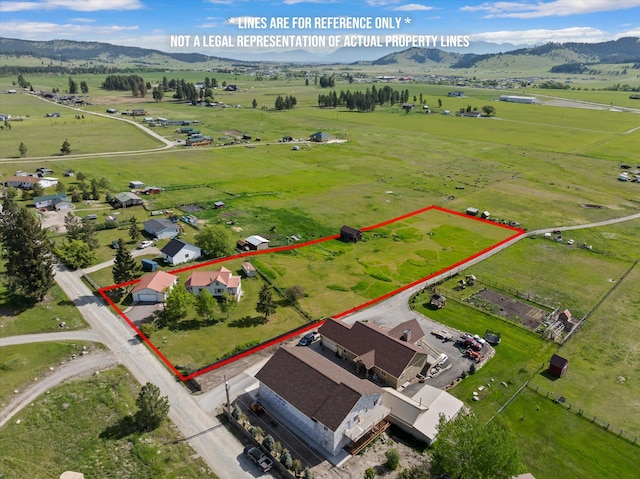 209 Caps Rd, Kalispell, MT 59901 - view of rural area with mountains and property parcel outlined