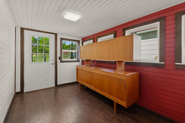 209 Caps Rd, Kalispell, MT 59901 - home office with wood finished floors, wooden ceiling, and wood walls