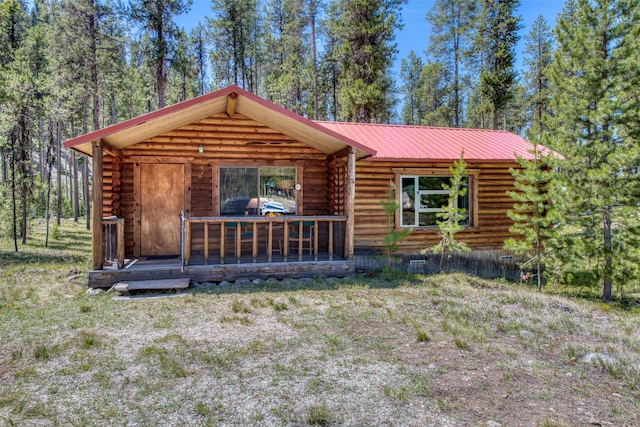 425 S O St, Sula, MT 59871 - cabin featuring log exterior and metal roof