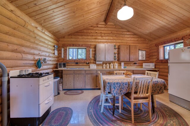 425 S O St, Sula, MT 59871 - kitchen featuring white appliances, wood ceiling, brown cabinetry, log walls, and light countertops